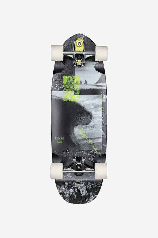 The Frothy Surf Skate Boards 30" - Mission features white wheels, a black and gray deck with a wave design, yellow-green geometric accents, and textured patterns at the nose and tail.