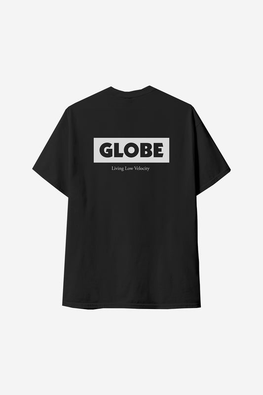 The Living Low Velocity Tee - Black features a large gray rectangle on the back with "GLOBE" in bold white letters and "Living Low Velocity" in smaller white text below.