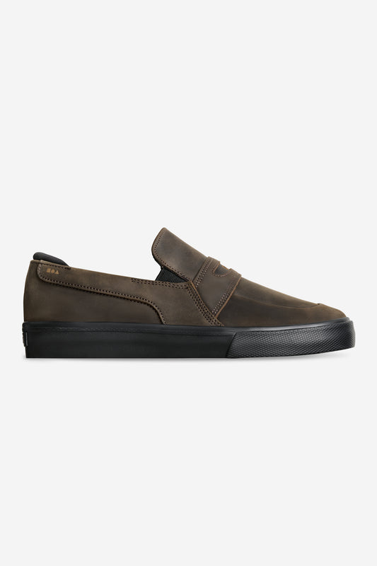 Liaizon slip on loafer with brown crocodile leather upper and black sole in side profile