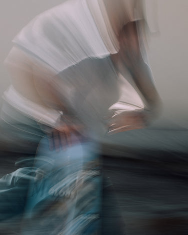 Action shot of skateboarder running.