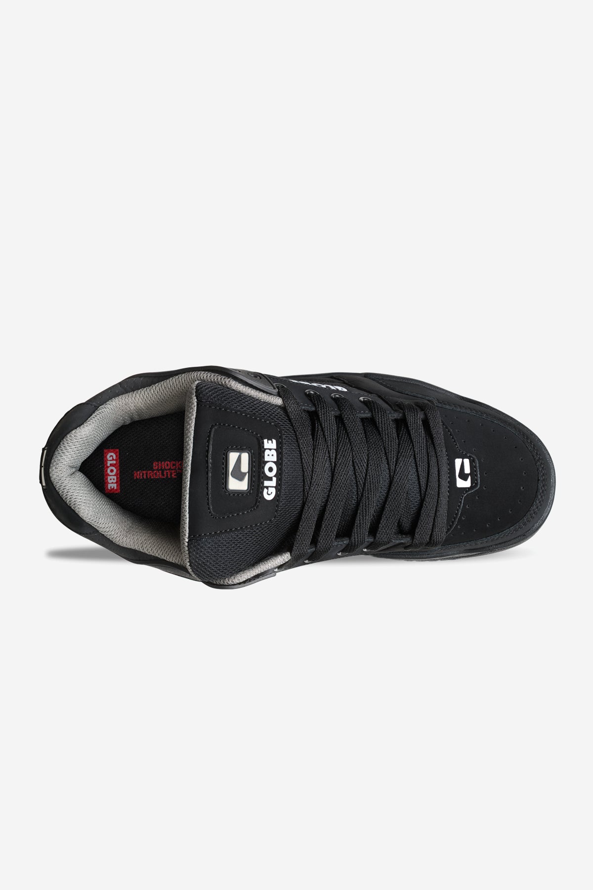 Top view of the Tilt - Black/Black TPR skate shoe featuring black leather, black laces, gray padded lining, Globe logos on tongue and insole, SHOCK MITIGATION text on the insole, and a durable Strobo cup sole for classic performance.