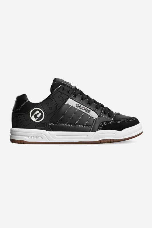 Profile view of the Tilt Black/White/Stitch.