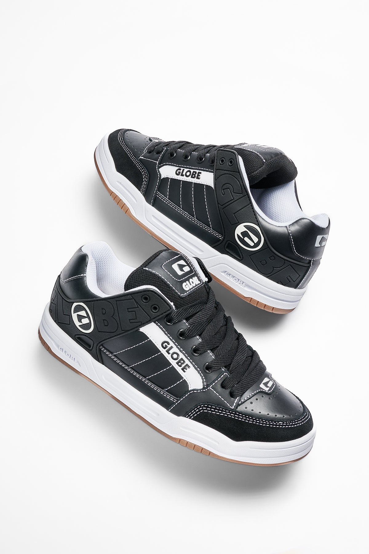 Studio image of the Tilt Black/White/Stitch.