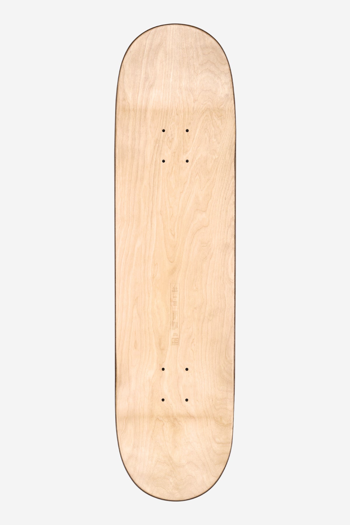 The Goodstock Deck 8.375" - Black is a plain skateboard deck, shown from above on a light gray background, featuring a natural wood grain finish and visible mounting holes for trucks.