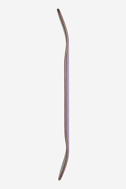 Side profile of Goodstock Deck 7.75 Desert Dusk with purple edge and wood core