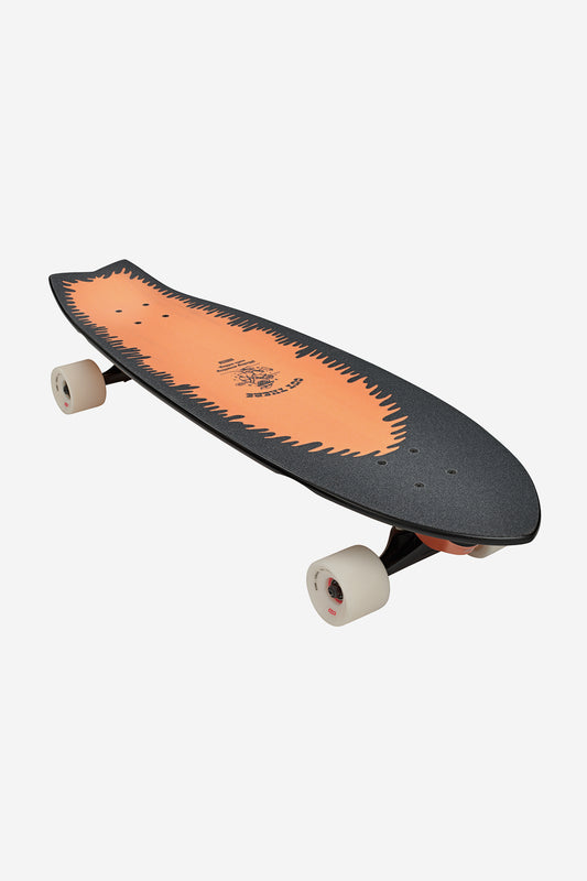 The Chromantic Surf Skate Boards 33" - Lightning Log features surf/skate trucks, white wheels, and a jagged orange and black deck design, shown diagonally on a plain white background.