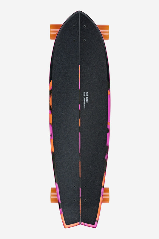 A top view of the Chromantic Cruiserboard 33" - Sea Devil, featuring black grip tape, vibrant orange and pink edges, orange wheels, and a durable Resin-7 hard rock maple deck, set against a plain white background.