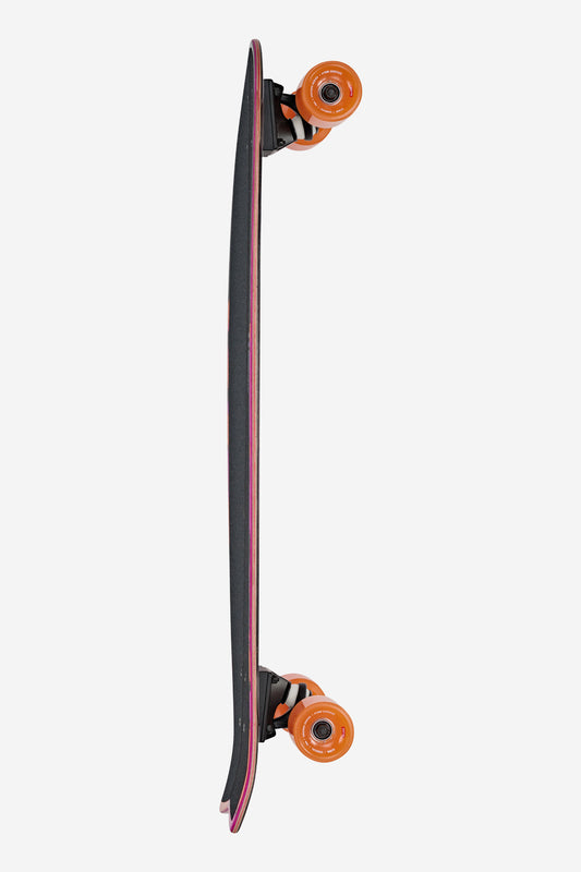 A top-down side view of the Chromantic Cruiserboard 33" - Sea Devil, a surf-inspired skateboard with a black Resin-7 hard rock maple deck featuring subtle curves at both ends and orange wheels, isolated on a white background.