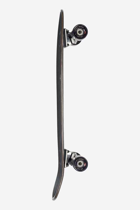 The Big Blazer Cruiserboard 32" - Melt is shown upright from the side, featuring a black deck, white wheels, and silver trucks against a plain white background.