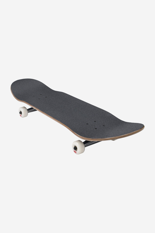 The Goodstock Complete 9.0" - Midnight Blue skateboard features a black grip tape surface, white wheels, and a wooden deck, shown on a white background.