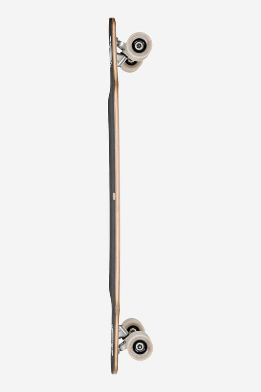 Top-down view of the Geminon 40 Rock Longboard 40" - Mediterranean, shown vertically to display its slim wooden deck, black grip tape, white wheels, and drop-through trucks against a plain white background.