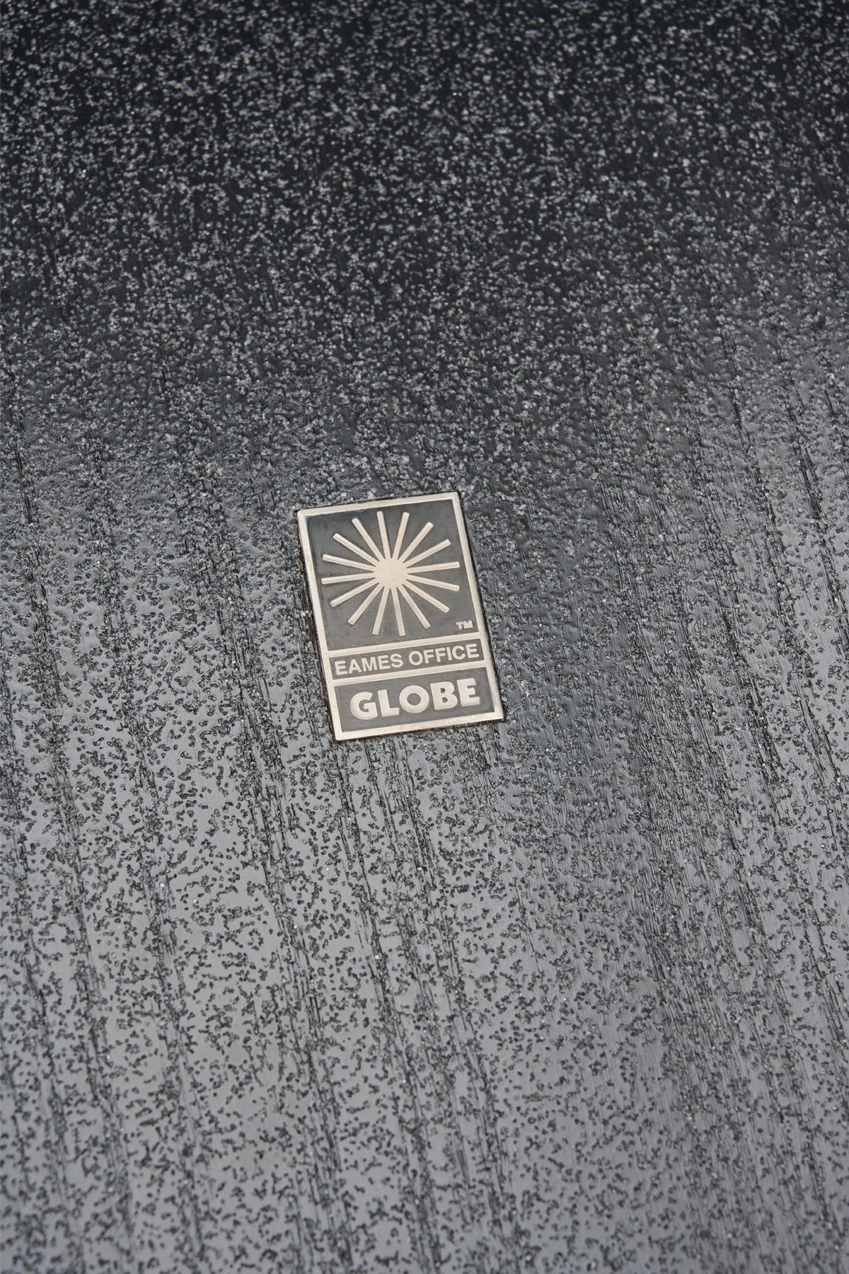 Eames emblem detail of Eames Lounge Longboard - Black Oak/Black