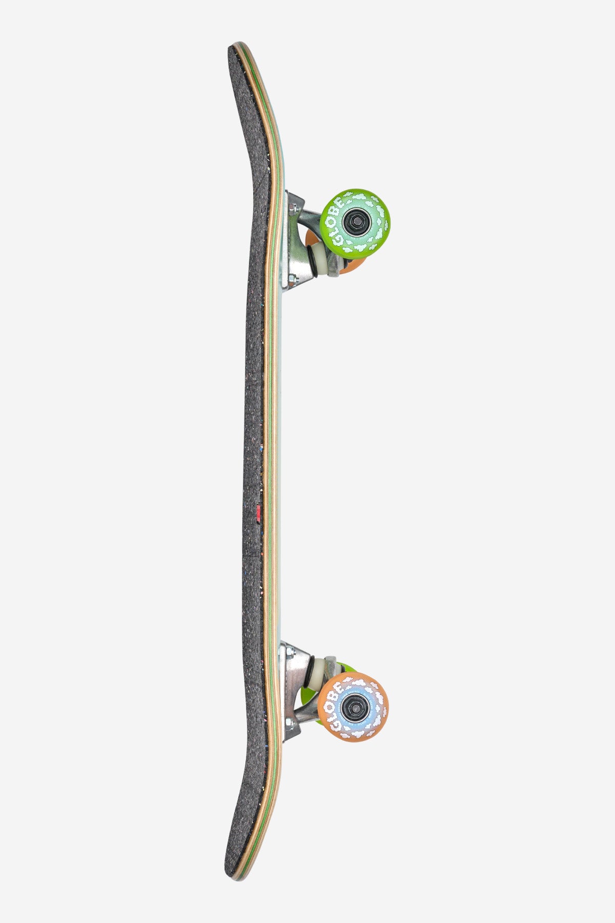 A side view of the Kids Softie Micro Complete 7.125" - Cacti Guy skateboard with black grip tape, metal trucks, and two visible wheels—one green and one orange—set against a plain white background.