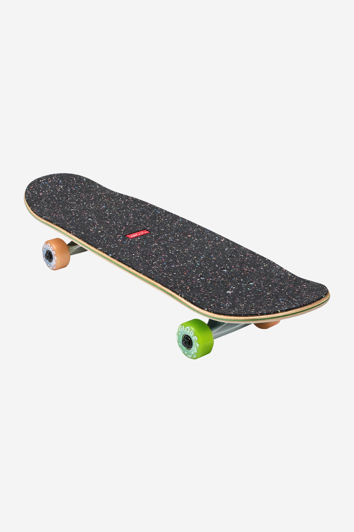 The Kids Softie Micro Complete 7.125" - Cacti Guy features black speckled grip tape, wooden edges, orange and green wheels, and silver trucks, shown on a white background.