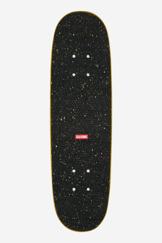 Close-up of black speckled grip tape on the yellow deck with a red Globe logo