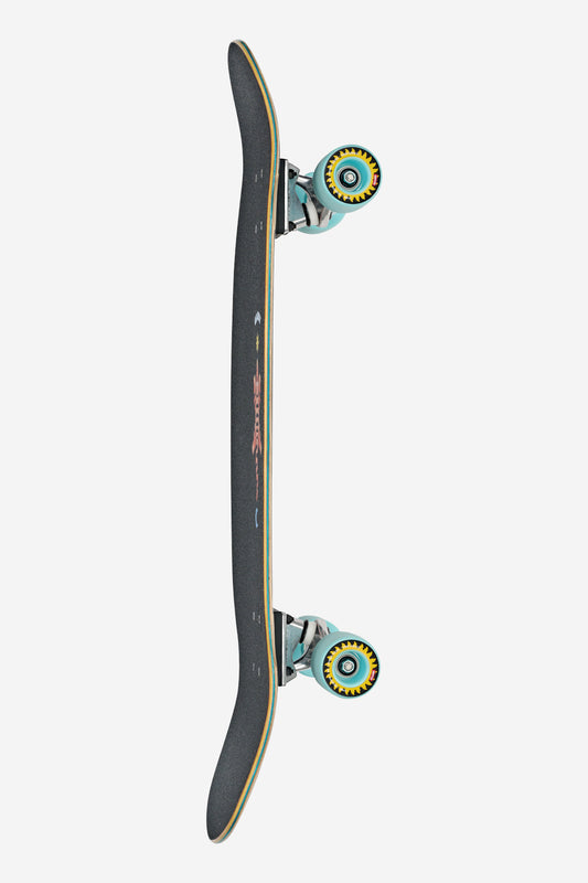 A side view of the Big Bad Bruiser Cruiserboard 33" - Lotus shows its black curved deck with grip tape, blue trucks, and multicolored wheels, all set against a clean white background.