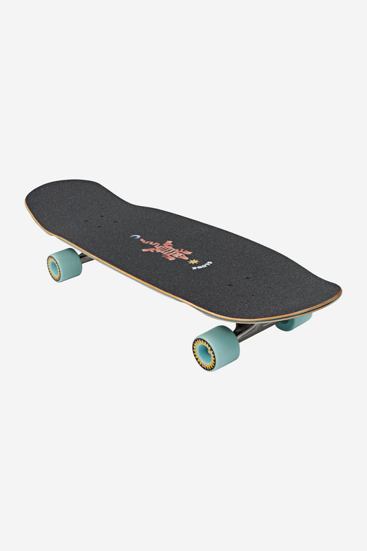 The Big Bad Bruiser Cruiserboard 33" - Lotus features a black deck with premium black grip tape, light blue wheels, and a vibrant center graphic. The skateboard is angled to highlight both its stylish deck and standout wheels.