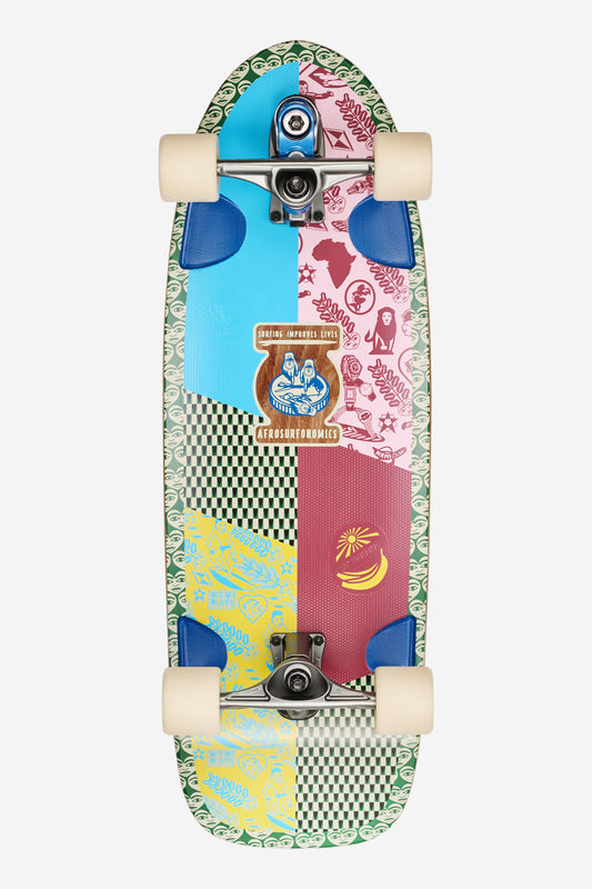 Walrus Surf Skate 31 Mami Wata with a colorful patchwork deck and cream wheels