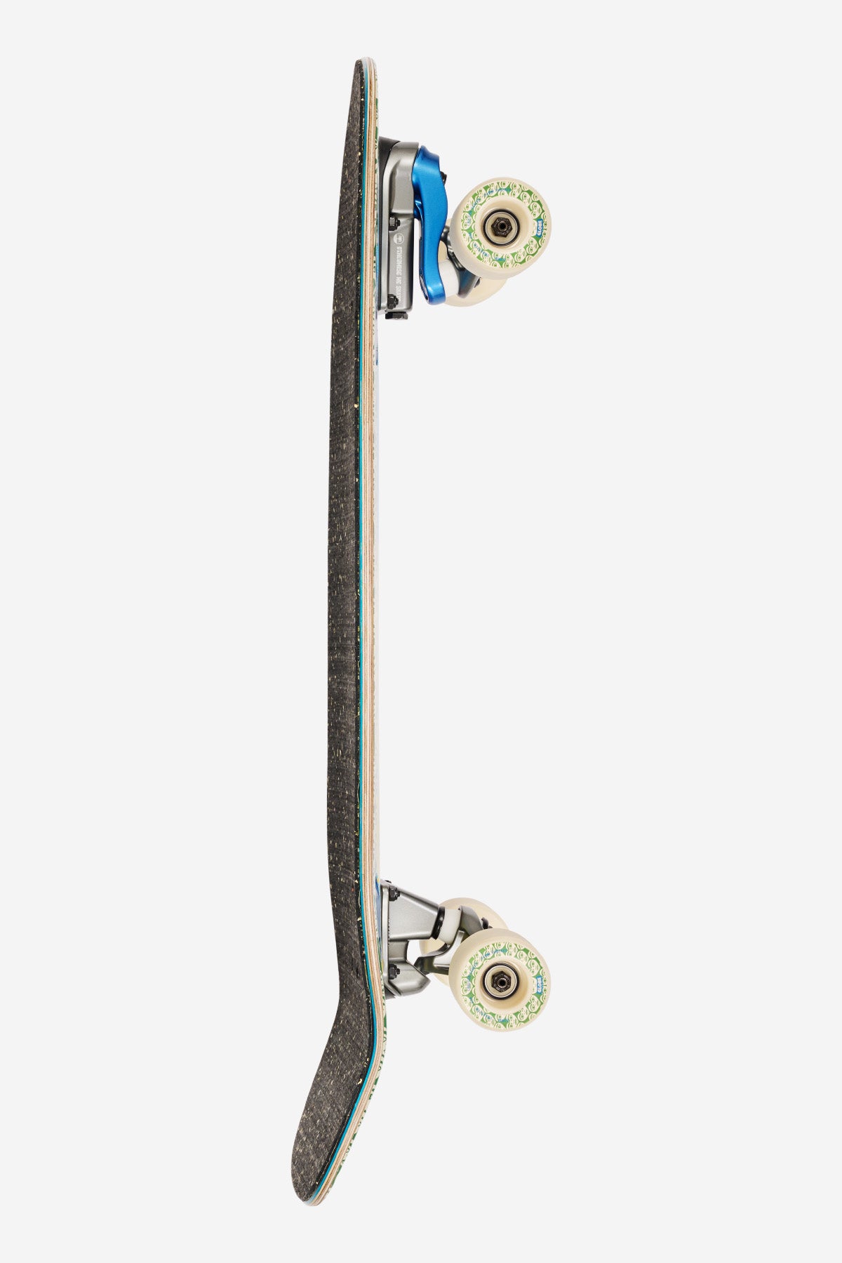 Side view of the Walrus Mami Wata 31 deck with speckled black grip teal edge and cream trucks