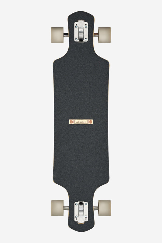 A top view of the Geminon 37.5 Longboard 38" - Arid shows a black drop-through deck with a wooden accent, white wheels, silver trucks, and the Globe brand name displayed at the center.