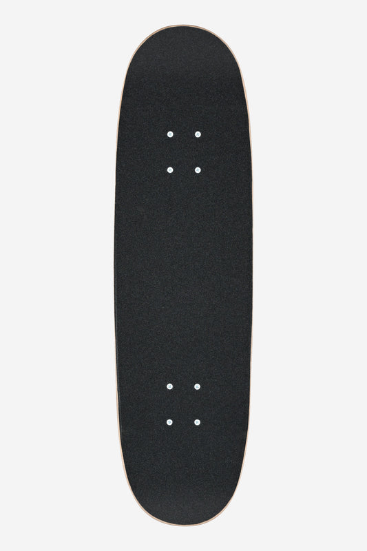 The Kids Wide Mid Complete 8.25" - Inner Balance features a black grip tape surface and pre-drilled holes for trucks and wheels, displayed from above against a plain white background.