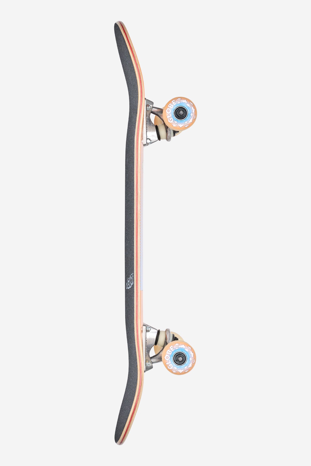 The Kids Wide Mini Complete 7.9" - Flaming Eye skateboard is shown from the side with black grip tape, visible wood layers along the edge, and orange wheels on metal trucks set against a plain white background.