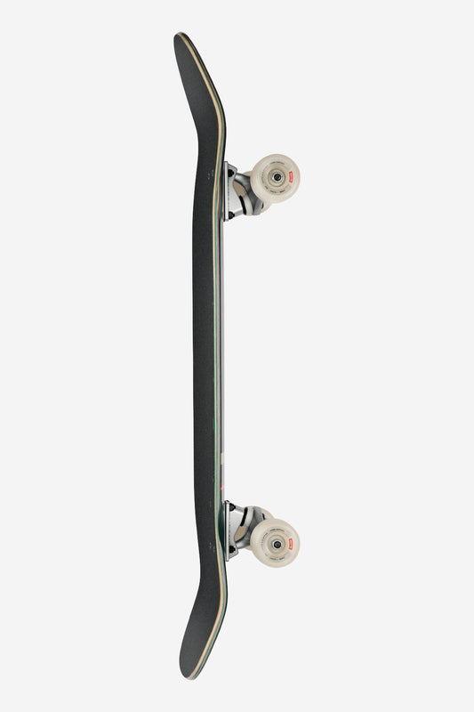 The Kerbo Cruiserboard 32" in Black Maple/Emerald Green is shown from the side, displaying its concave pool shape, medium-soft wheels, and silver trucks on a plain white background.