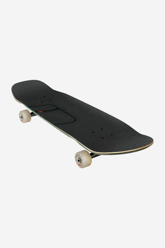 The Kerbo Cruiserboard 32" in Black Maple/Emerald Green features a pool shape, black grip tape, a wooden deck, and medium-soft wheels, displayed at an angle on a plain white background.