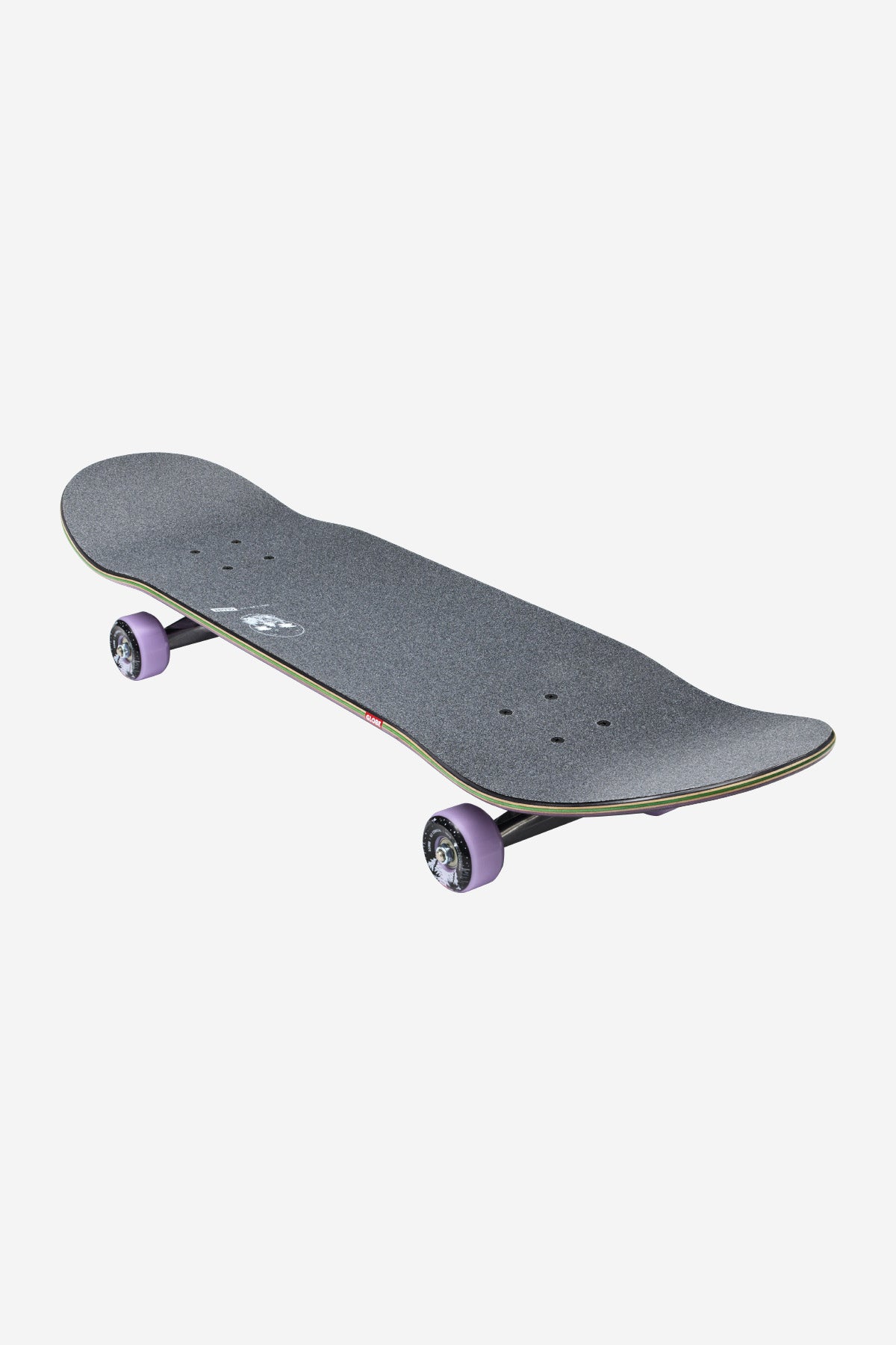 The G2 Reflection Complete 8.5" - Black/Purple skateboard features a standard black textured grip deck, light purple wheels, and silver trucks, displayed on a white background.