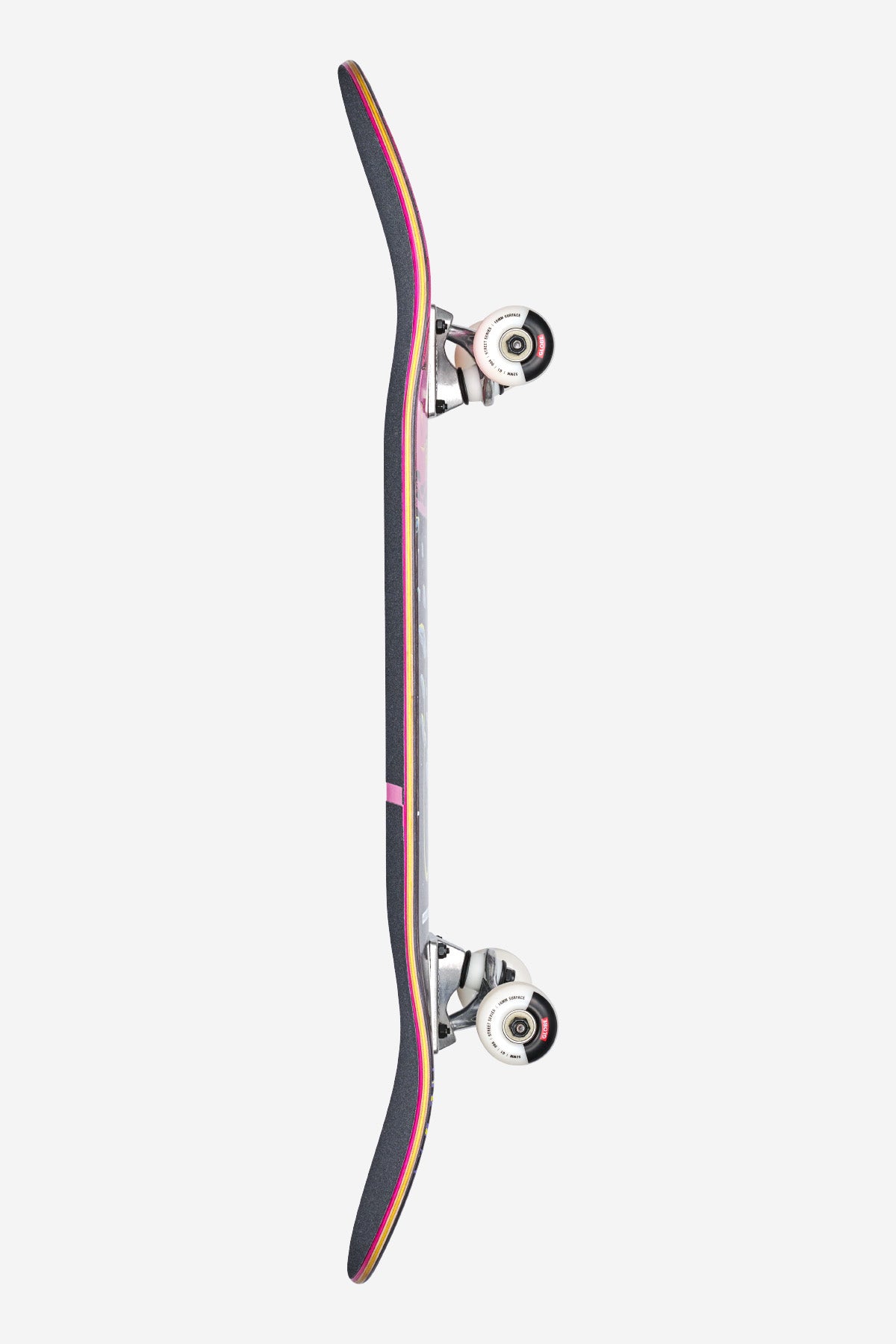 The G1 Where To Next Complete 8.375" - Black Maple/Recon skateboard is shown side-on, featuring a curved hard rock maple deck with black grip tape, faint pink edge stripe, visible wheels, and Tensor alloy trucks against a plain white background.