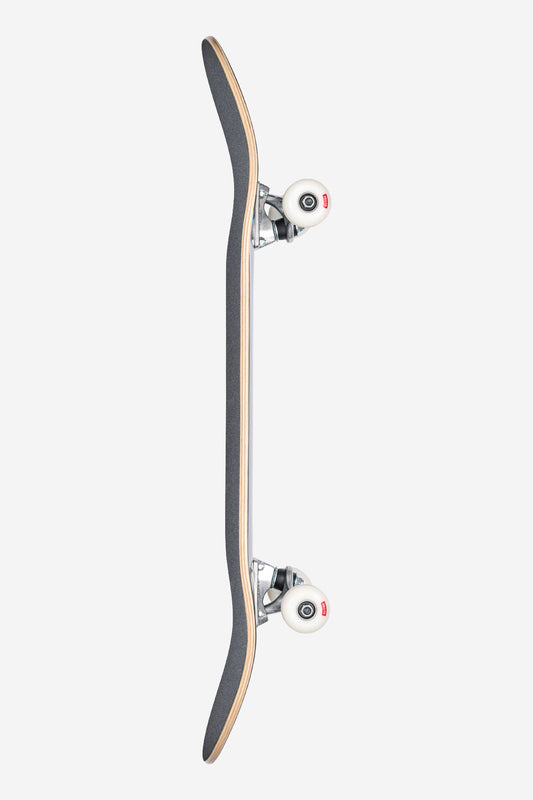 A top-down view of the G0 Unfussed Complete 8.25" - Technotrap skateboard, positioned vertically with black grip tape, exposed wooden edges, and white wheels at both ends set against a plain white background.