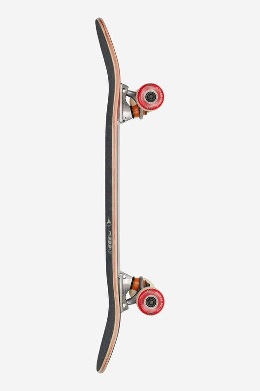 Profile shot of a Lil R.i.p.per skateboard showing curved deck, natural wood edge, black grip tape, and red wheels.