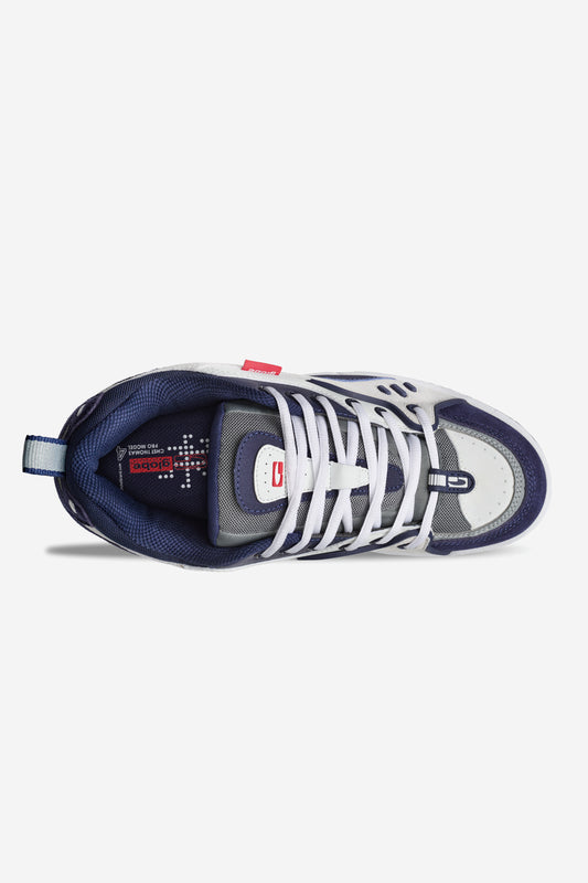 Top view of the Globe CT-4 - White/Navy skate shoe with white laces, a patterned navy inner lining, red tag and Globe branding on the tongue and insole. Designed by Chet Thomas in white, gray, and navy blue.