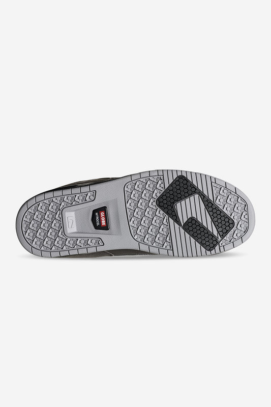 Globe CT-4 outsole bottom view with tread and logo patch