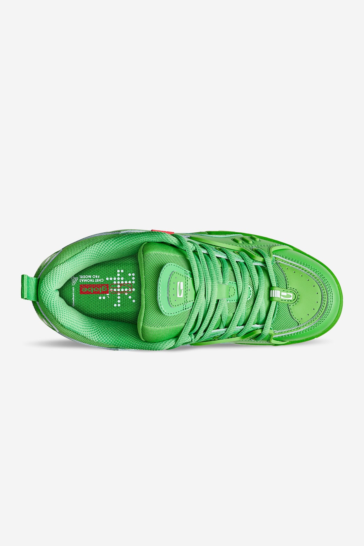 Top view of the CT-4 - Green sneaker featuring vibrant green color, matching laces, a textured tongue, red and white insole detail, heel loop, and a chunky layered design.