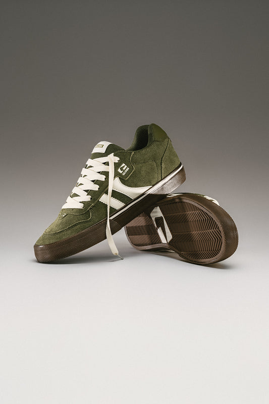 Angled product shot of olive green Encore II skate shoe with white side stripes and brown sole
