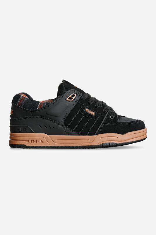 Black Globe Fusion skate shoe with tartan lining and tan outsole