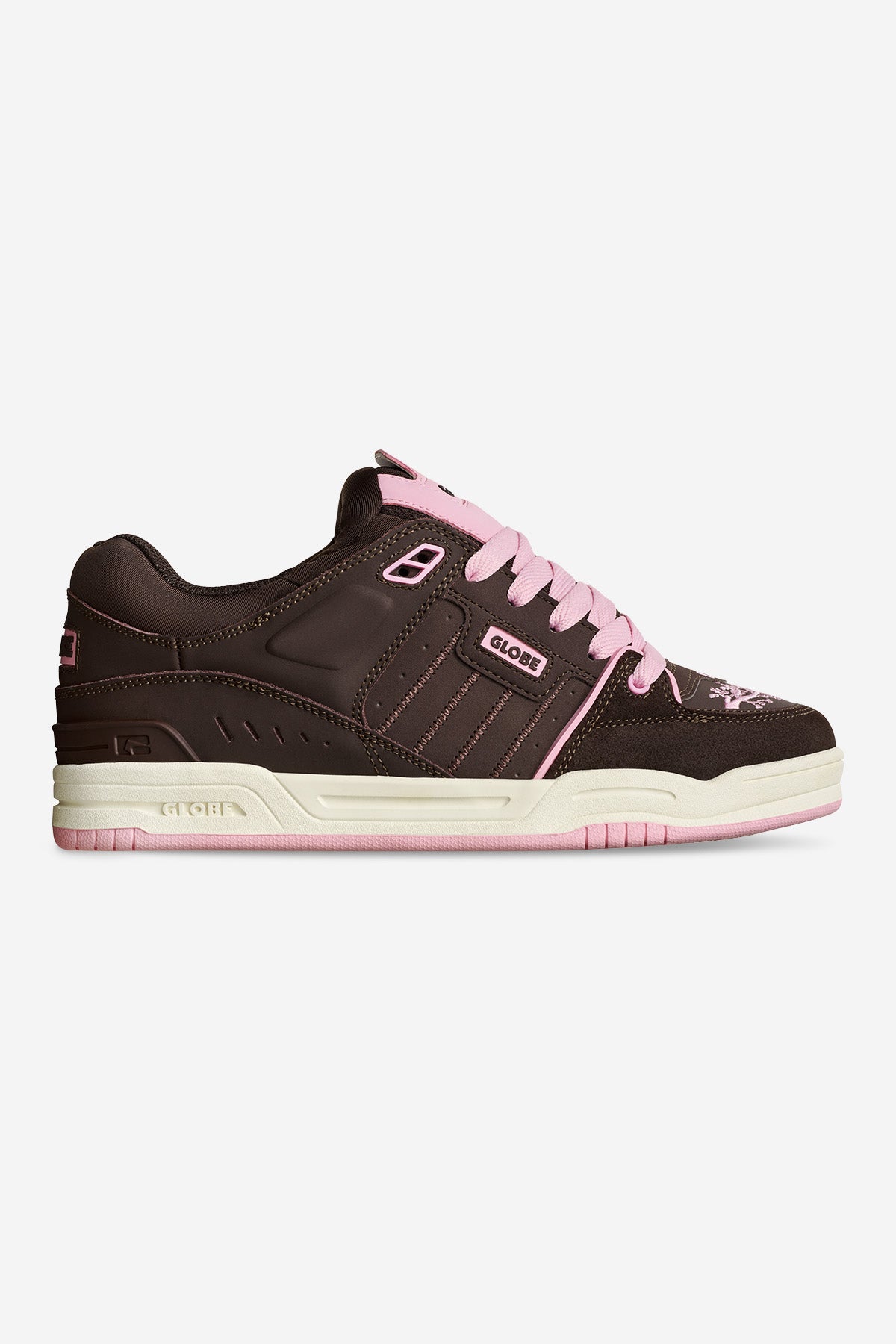 Side view of brown Fusion skate shoe with pink laces and floral toe accents