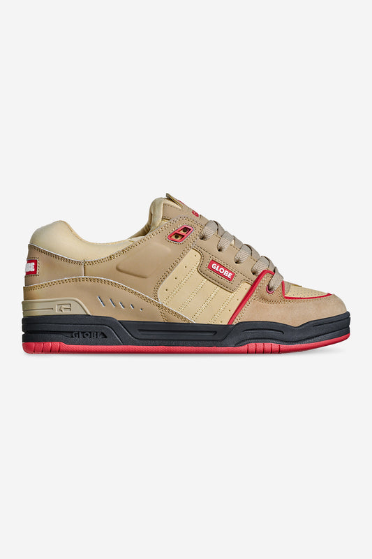 The Fusion - Khaki/Red is a tan and beige skate shoe with red accents, brown laces, layered panels, a black sole, and the GLOBE logo on the side and heel.