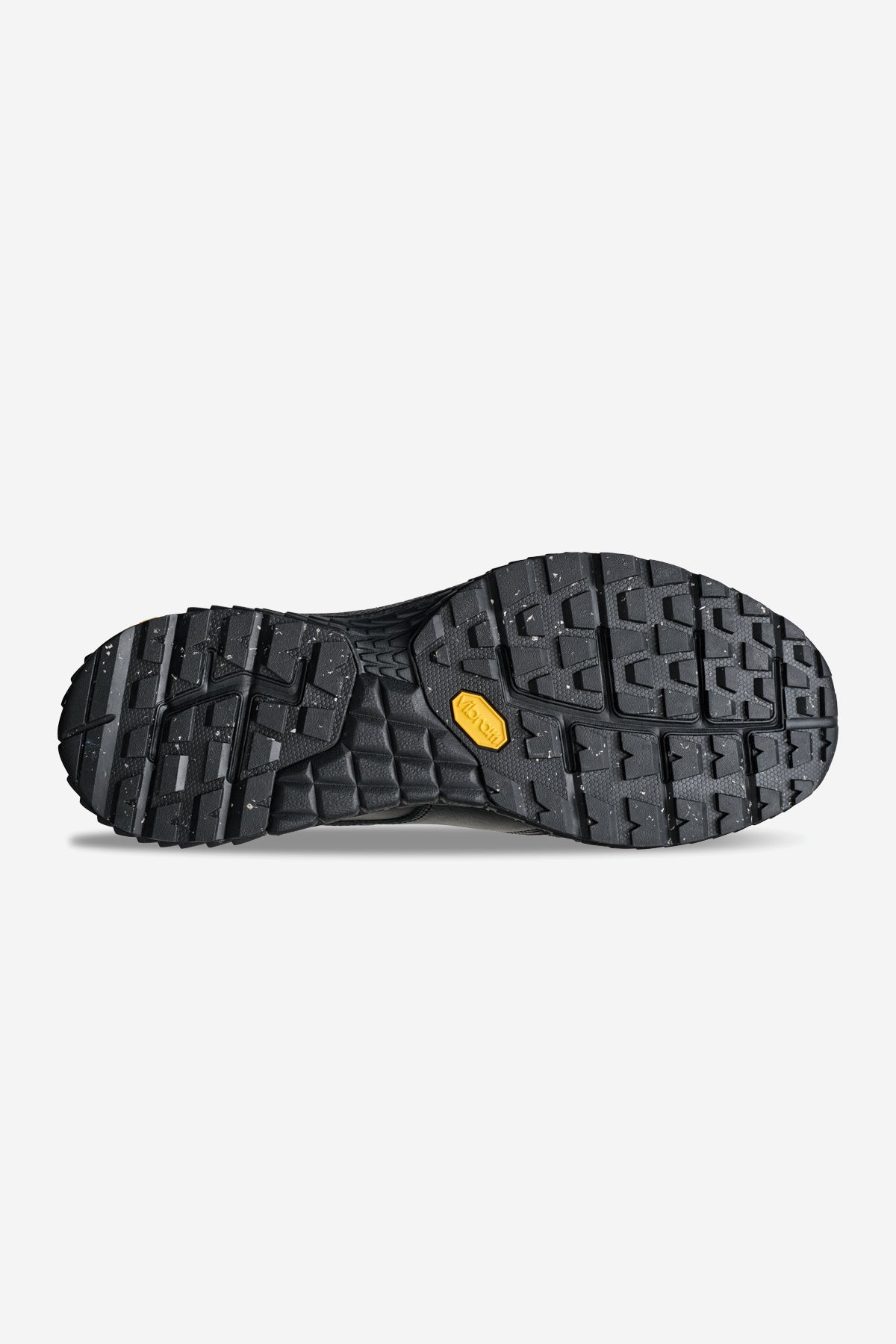 The Liaizon Vibram - Black features a black rubber sole with a rugged, textured tread and a small yellow Vibram logo at the center.