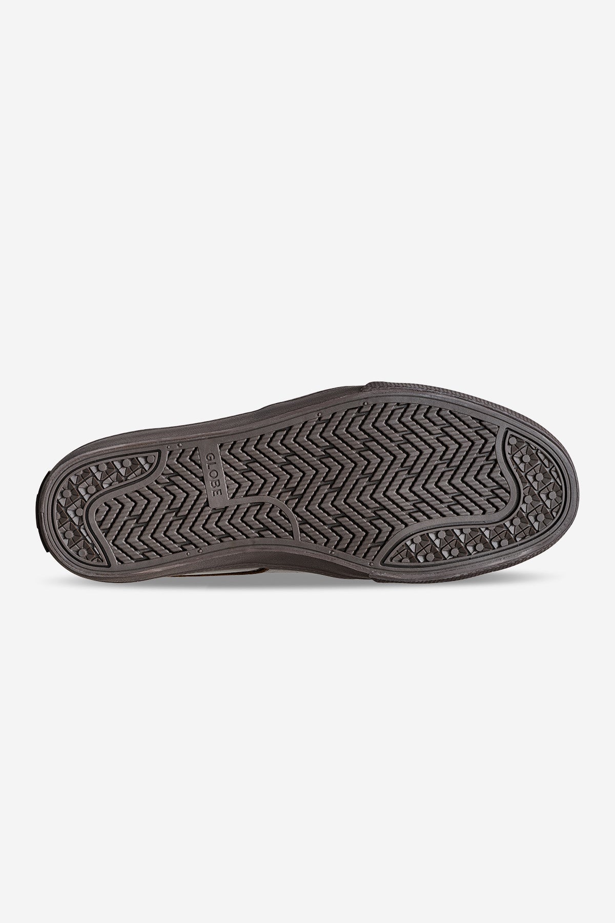 The image displays the black rubber sole of the Liaizon - Dark Brown shoe, with a herringbone tread in the center, diamond patterns at toe and heel for grip, and the GLOBE brand name embossed near the arch.