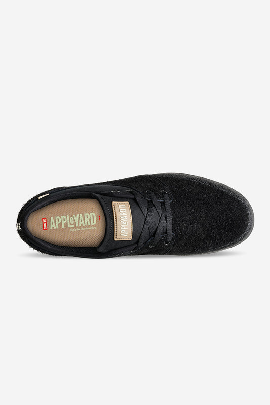 Top view of black Mahalo skate shoe with textured crepe upper and laces, insole branded Appleyard
