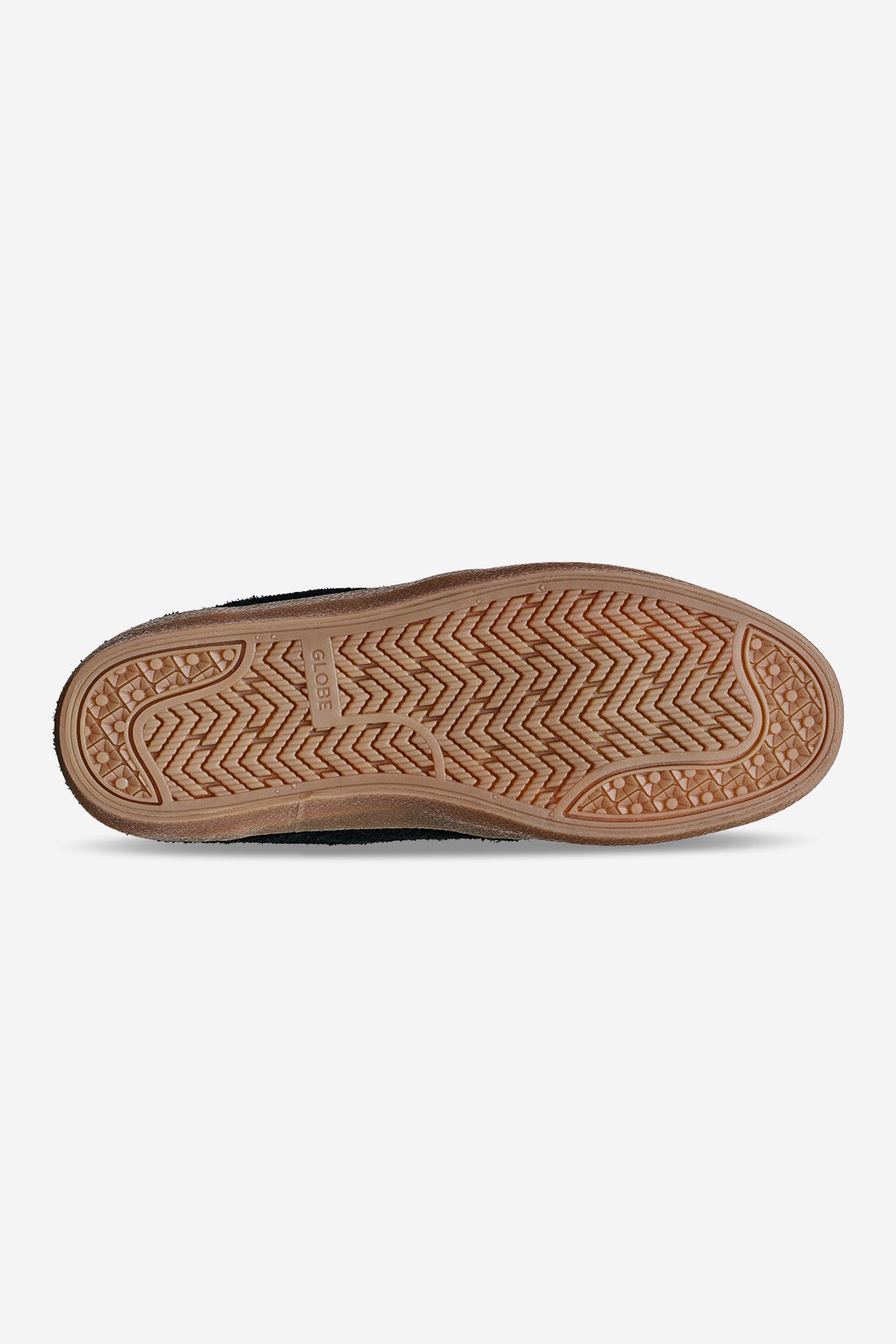 The image shows the sole of the Mahalo - Black/Gum/Crepe shoe, featuring a light brown gum rubber sole with a textured herringbone and geometric tread pattern.