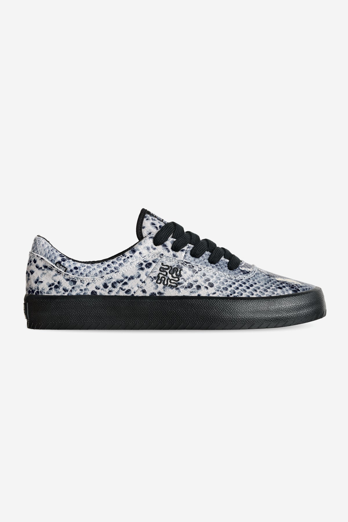 The Melbek - Wasted Talent Black/Snake is a low-top sneaker with a black sole and laces, a white and gray snakeskin upper, and a small black side logo.
