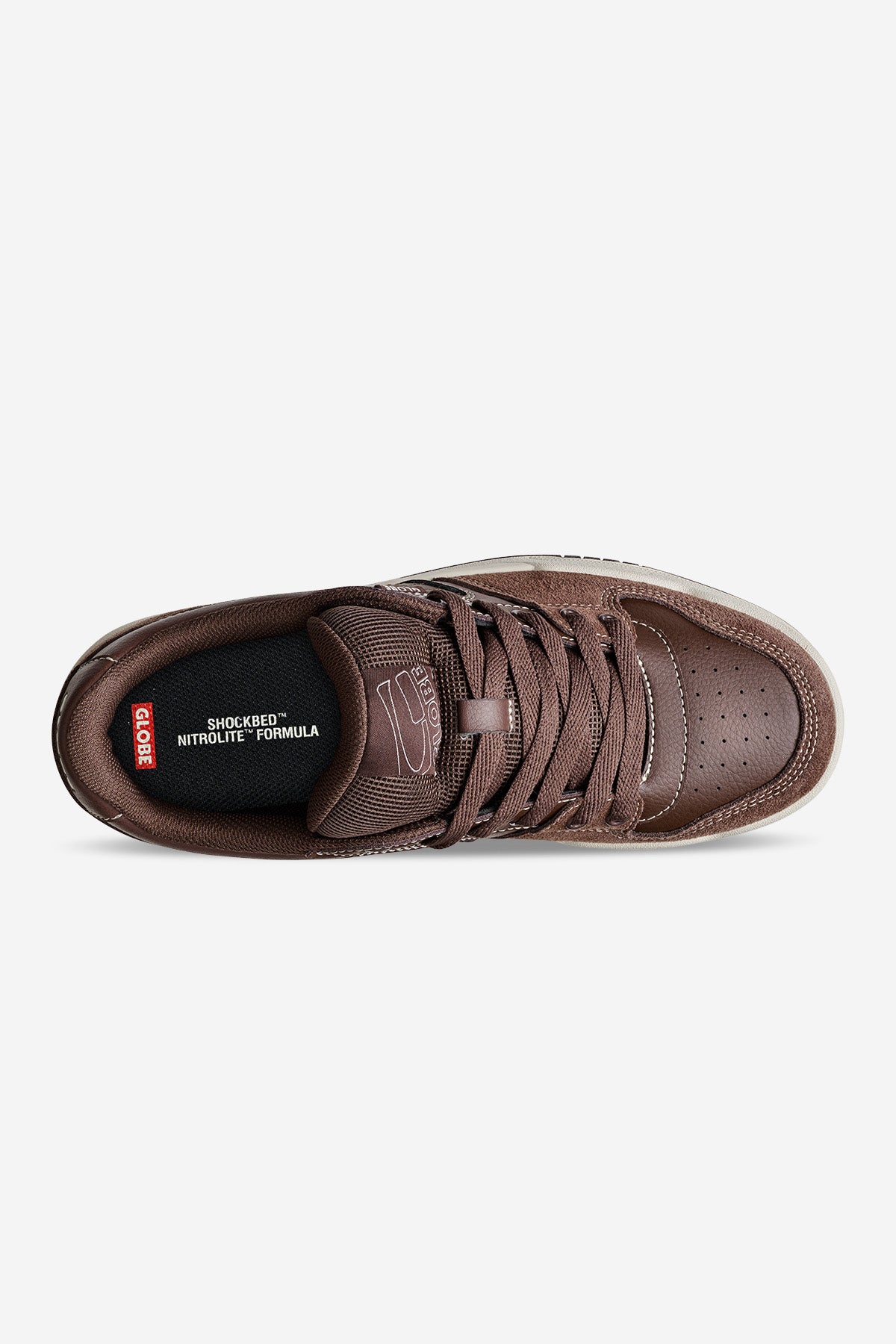 Top view of the Mojo 2.0 - Brown/Antique sneaker featuring a perforated toe, brown laces, white sole, white insole text—SHOCKBED NITROLITE FORMULA—and a red and white Globe logo near the heel.