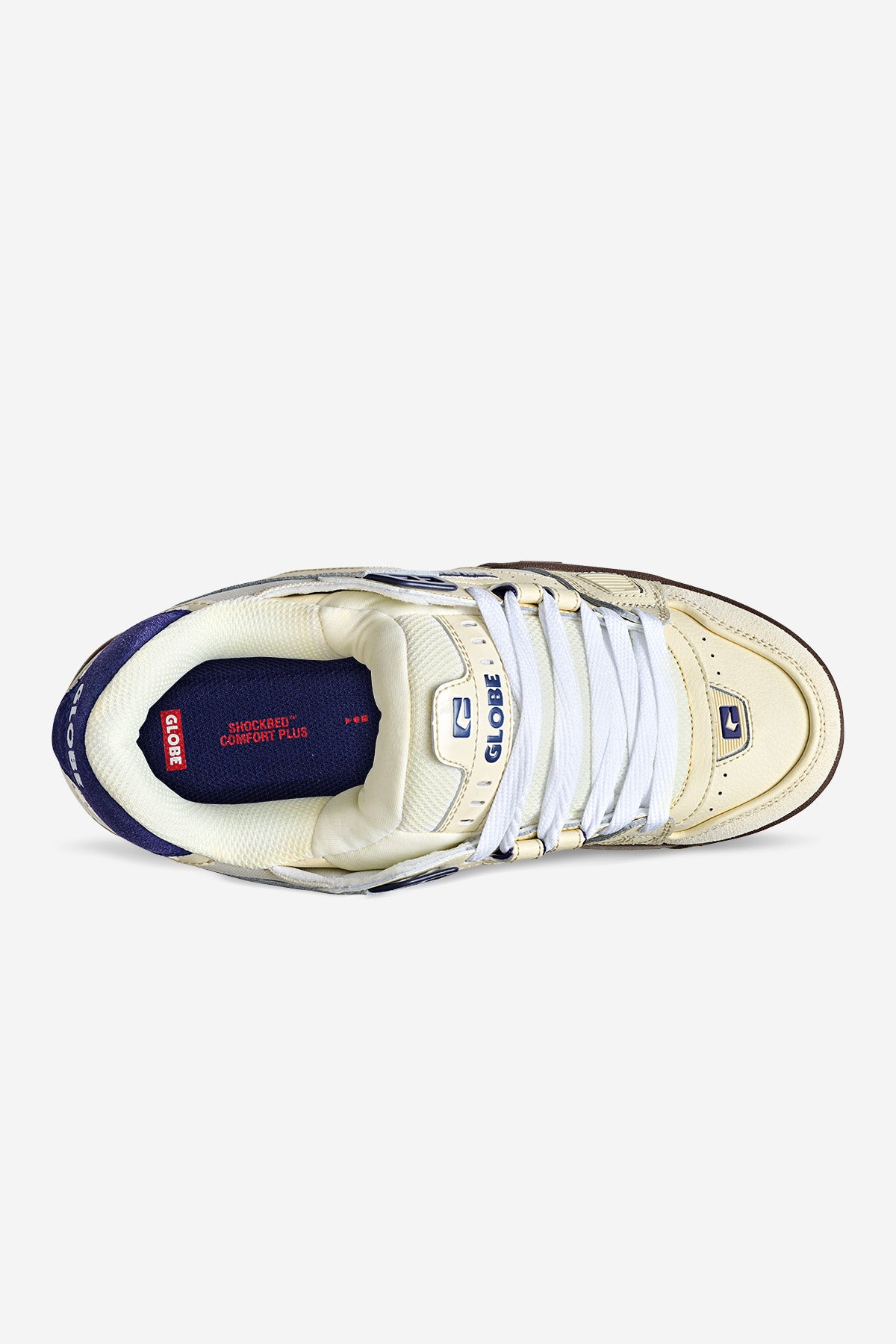 Top view of the Sabre - Antique White/Blue skate shoe featuring cream and navy tones, white laces, blue interior lining, and red SHOCKBED COMFORT PLUS branding on the insole.