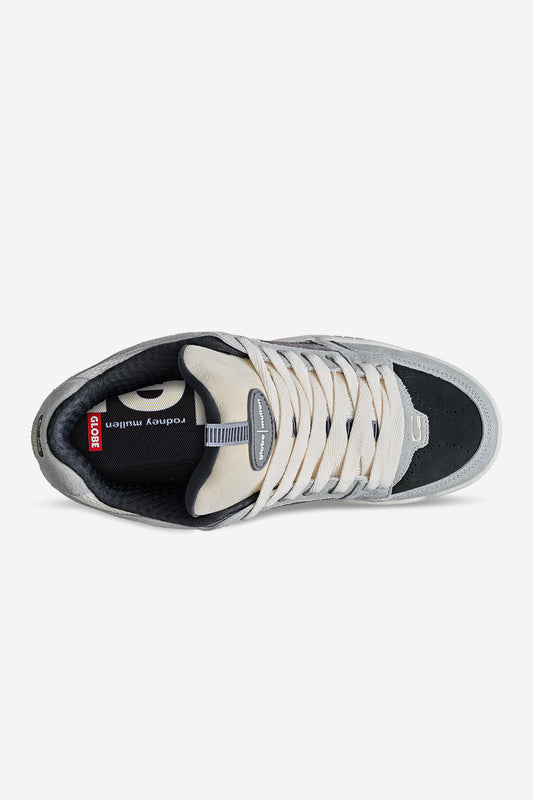 Top view of the Tilt Prime - Grey / Mullen Globe skate shoe featuring beige laces, black inner lining, and branding on the tongue and insole, set against a plain white background. Inspired by Rodney Mullen.