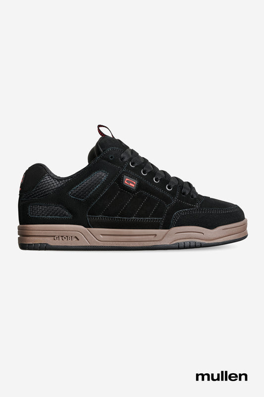 Globe Tilt Prime skate shoe in black with gum sole and red accent pull loop