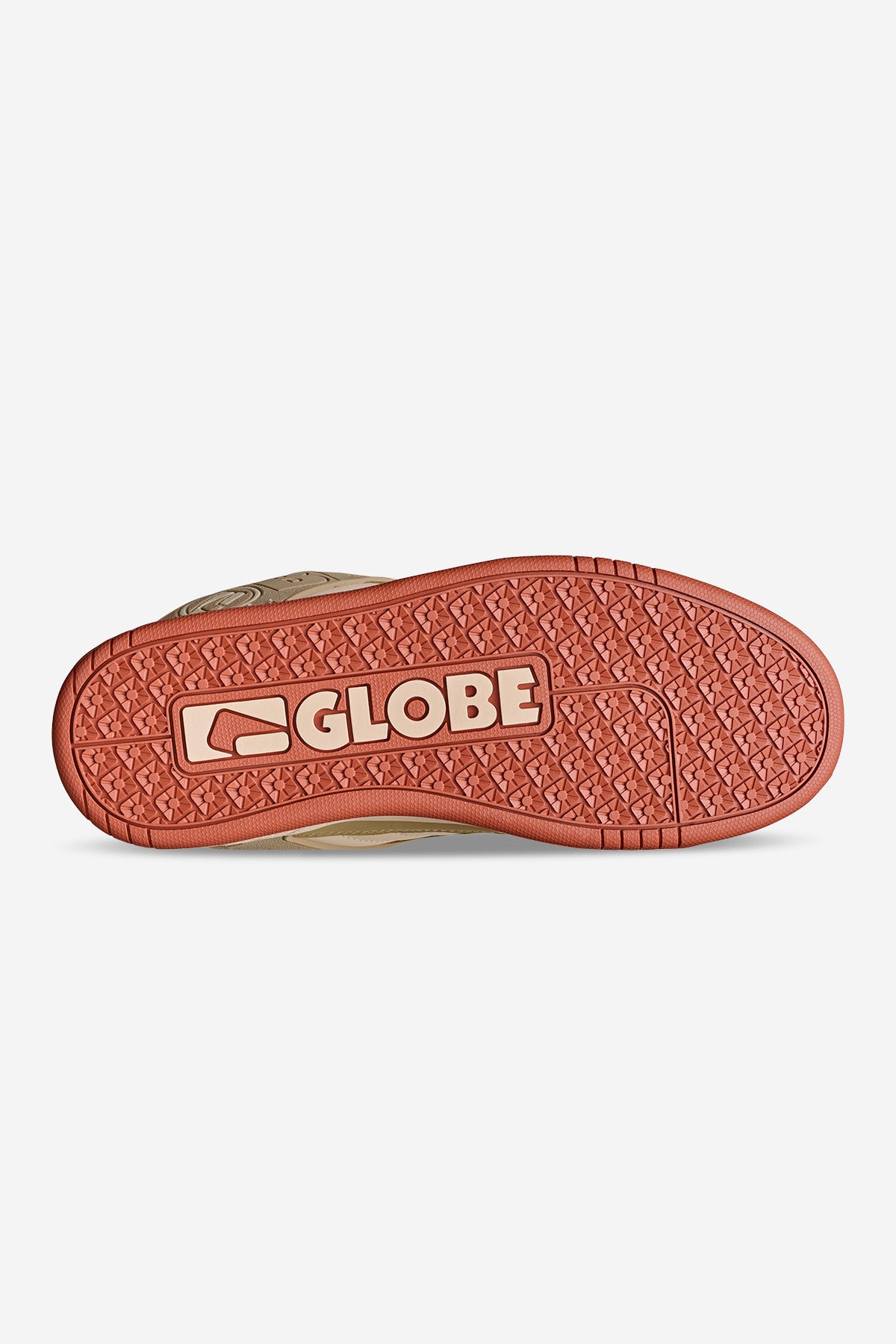 The image shows the sole of the Tilt - Sand/Red shoe, featuring a reddish-brown color with "GLOBE" in large white letters at the center and a textured, patterned grip.