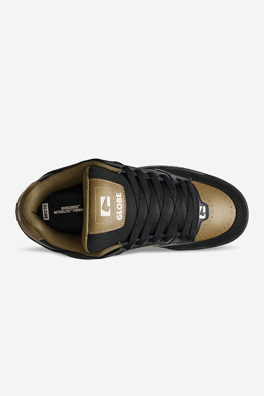 Tilt skate shoe in black and granite with tan overlays, featuring padded collar and Globe emblem on the tongue